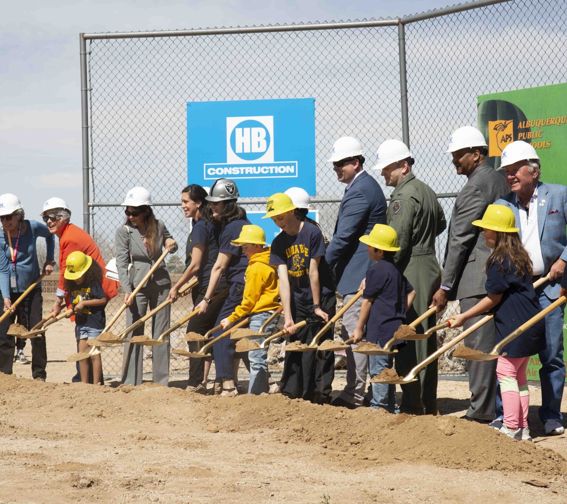 Staff and students break ground.